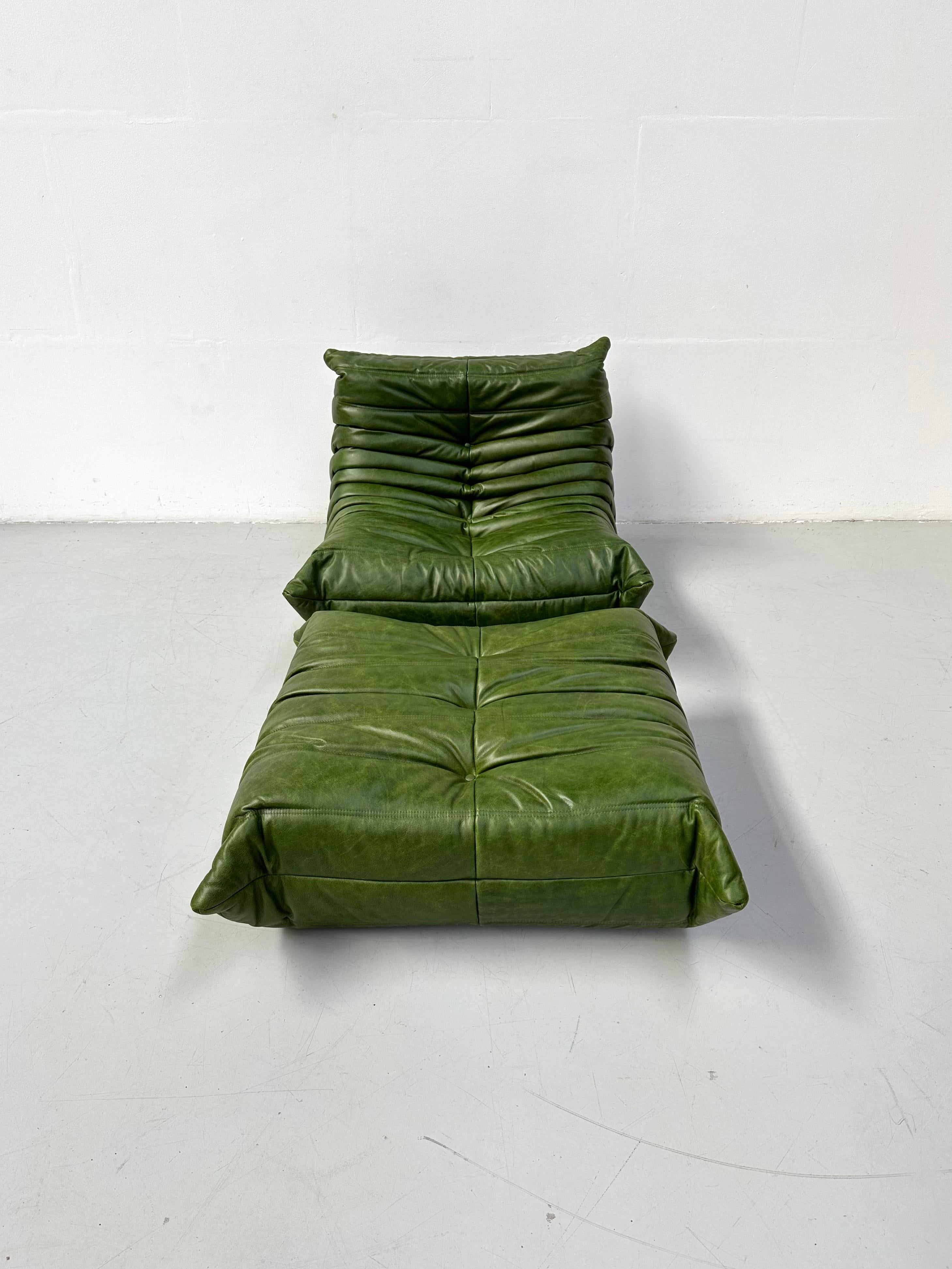 Mid-Century Modern French Togo Chair and Ottoman in Green Leather by M. Ducaroy for Ligne Roset.