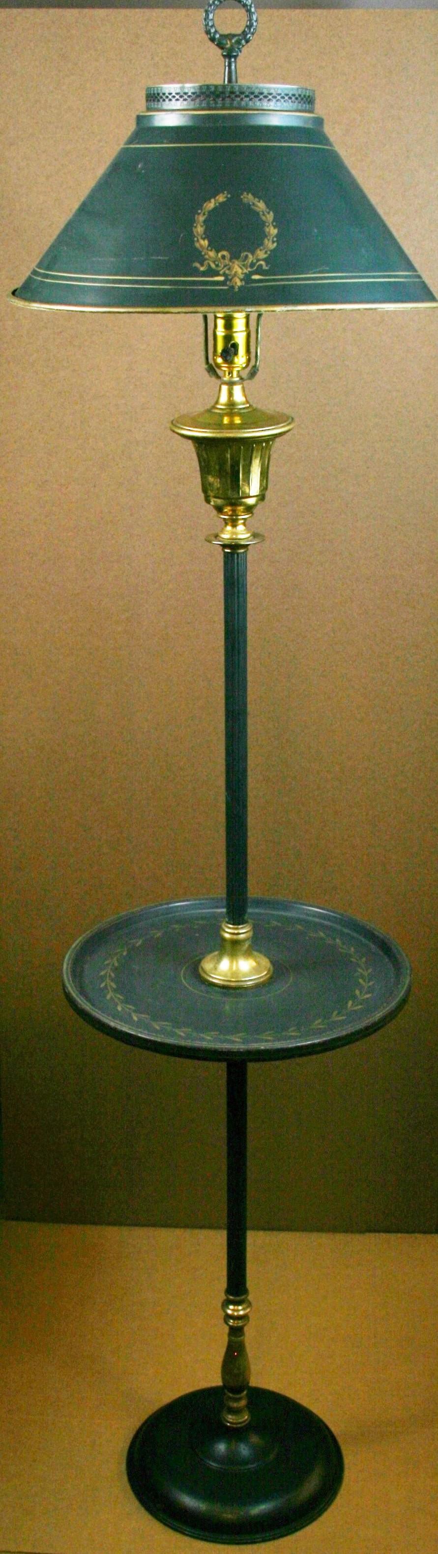3-755 French tole and brass floor lamp with attached table
Hand painted details
Rewired takes on Edison based bulb 100 watt max
16