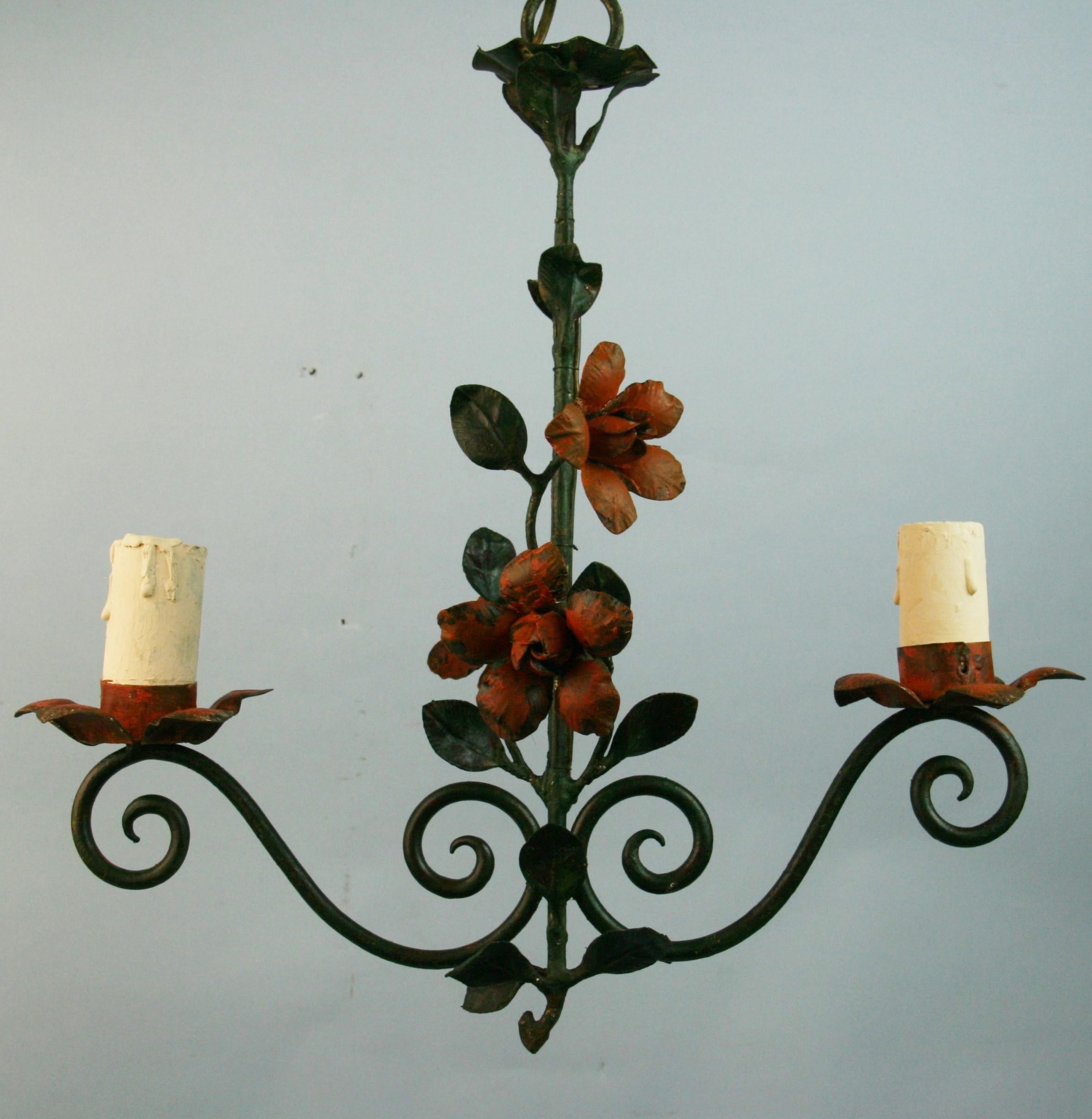1268 French Tole flower and leaves 2 light chandelier
60 watt candelabra based bulbs.