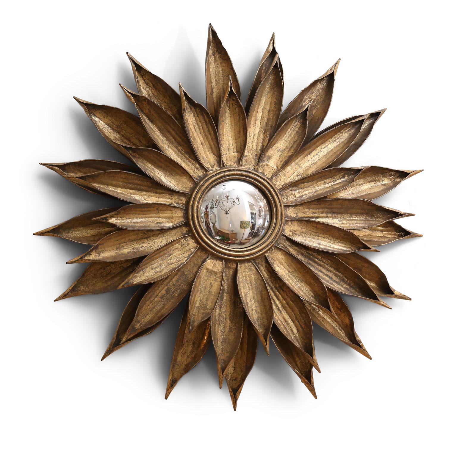 French tole flower-shape mirror, circa 1950-1969. Frame surrounds a convex mirror and is adorned in its original gilded finish.