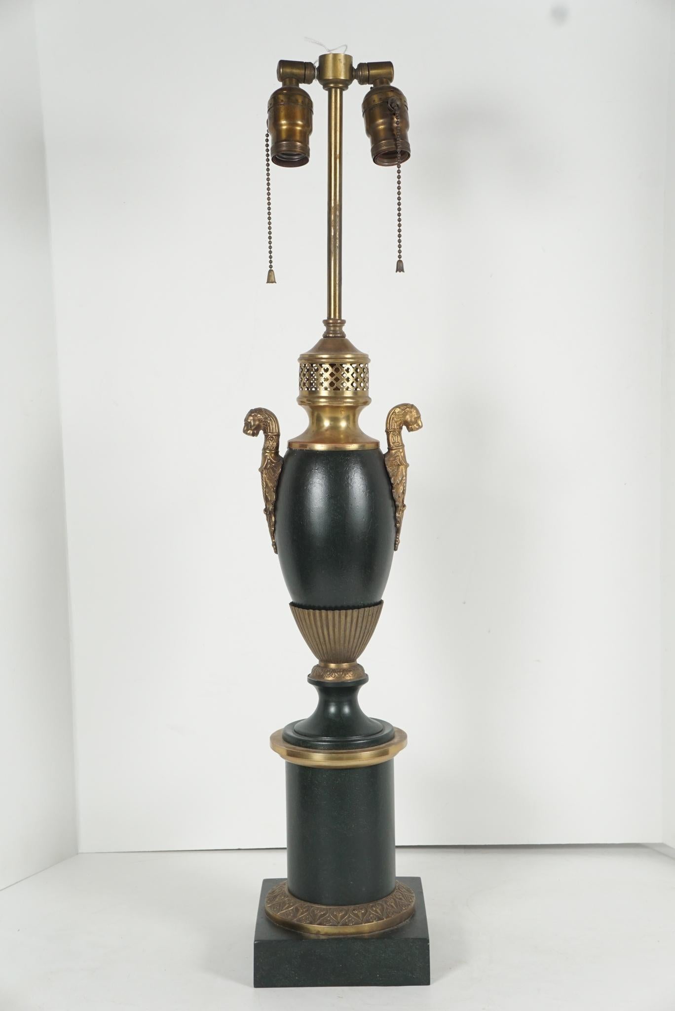 This fine old lamp made of tin, gilded brass and cast bronze would have had a burner at one point but now has been converted to electricity It comes from the estate of Paul and Bunny Mellon and once formed part of the decorative elements in their