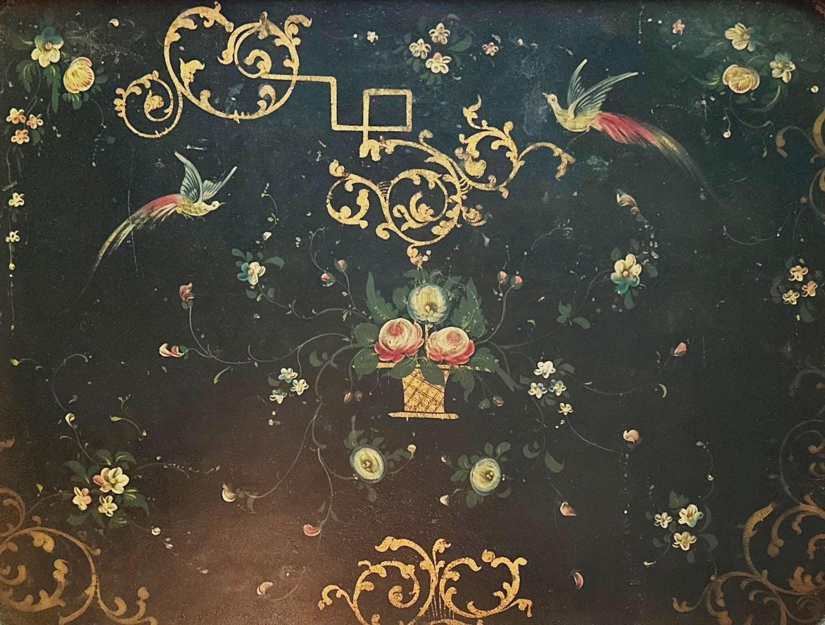 A beautiful antique tole tray dating from the 1800s, France with hand painted birds and florals.