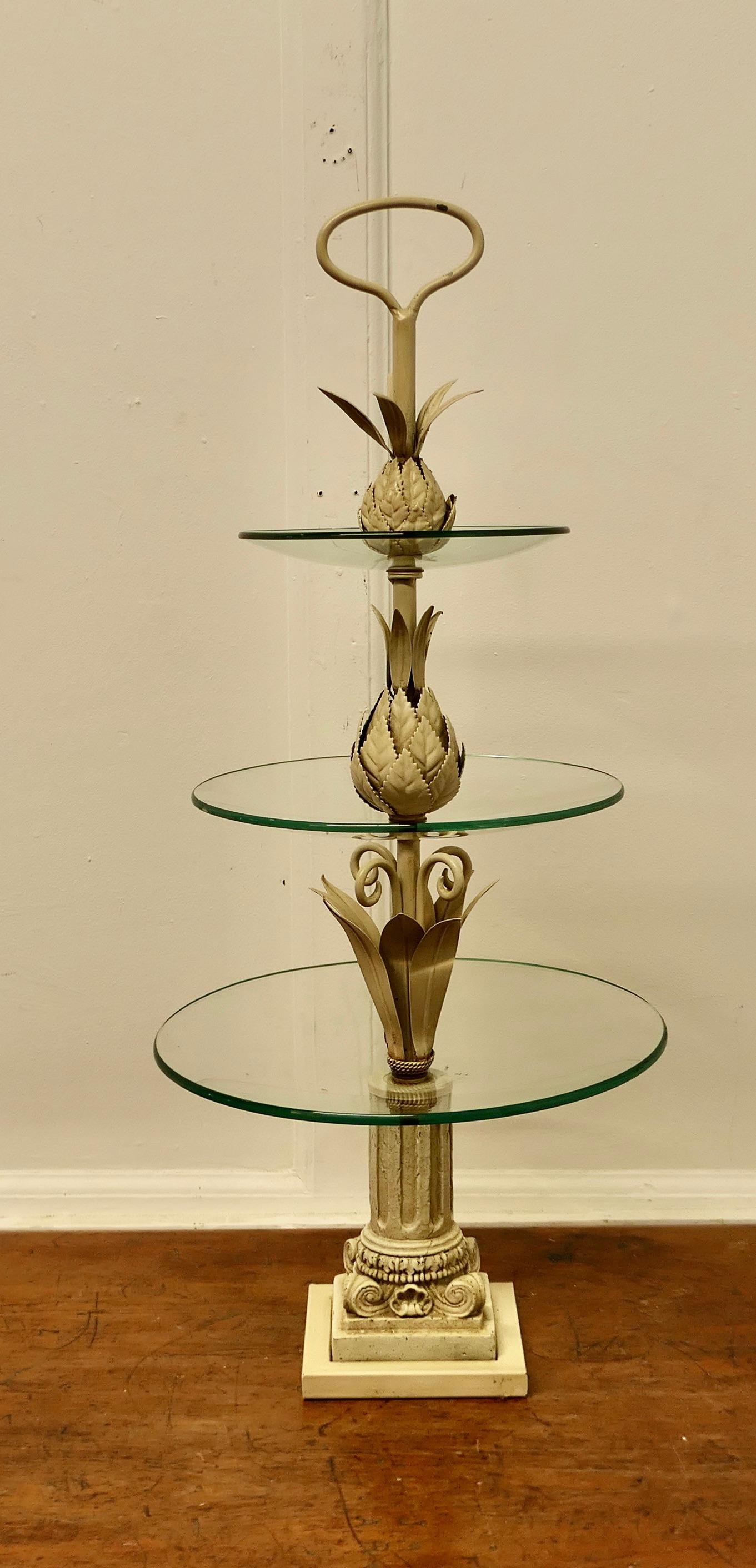 French Toleware Gueridon Cake Stand or Dumb Waiter 

A charming and unusual piece in good condition, it has a central column decorated with toleware pineapples, supporting 3 Glass plates  
The stand is in good condition, it is 34” tall and 14” in