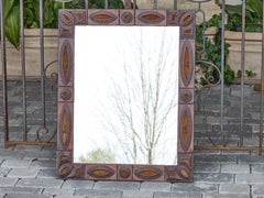 French Tramp Art Mirror with Chip-Carved Frame and Medallions, circa 1900