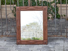 French Tramp Art Mirror with Deeply Carved Geometric Frame, circa 1900