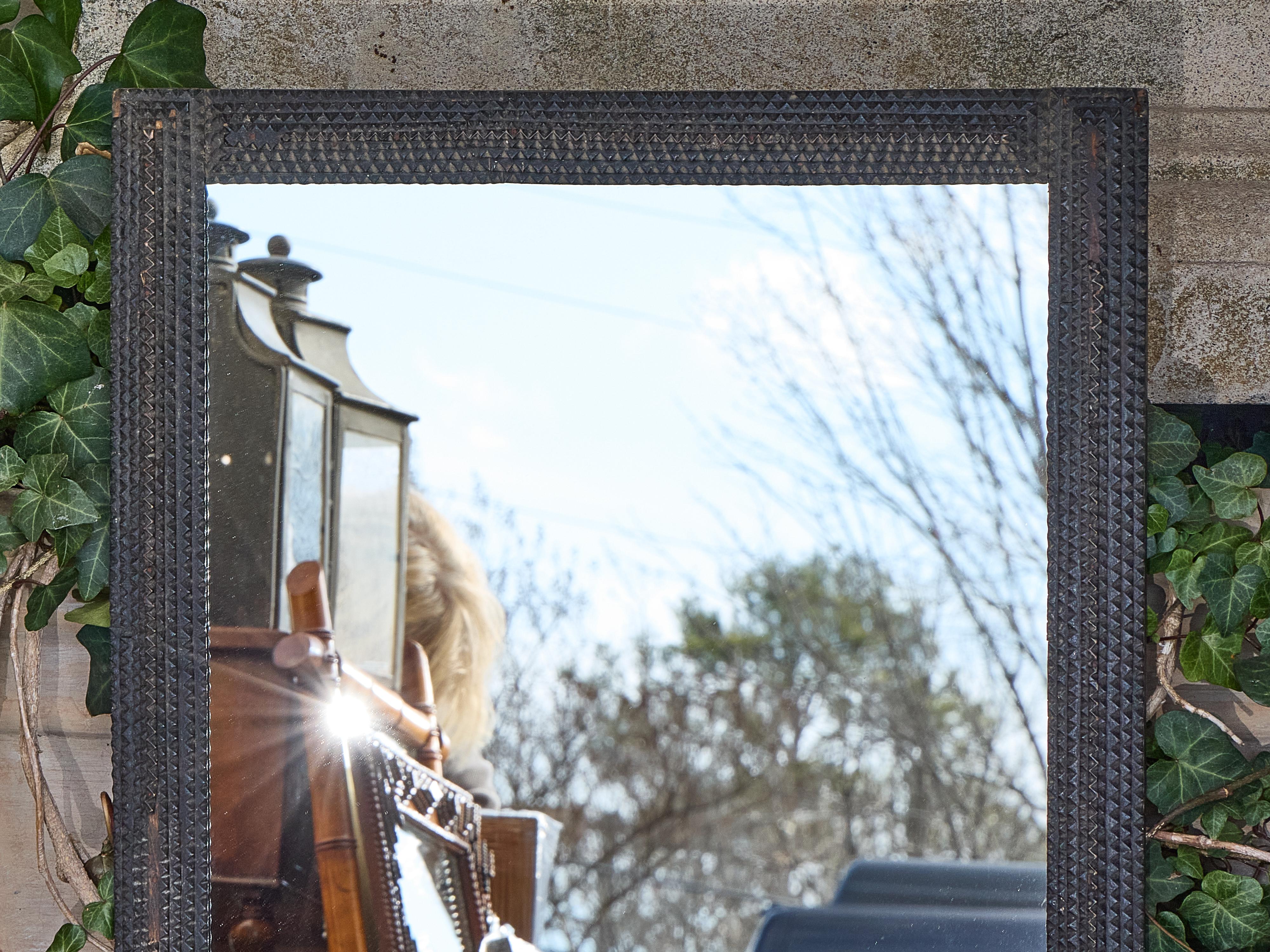 Hand-Carved French Tramp Art Mirror with Deeply Carved Geometric Frame, Circa 1900 For Sale