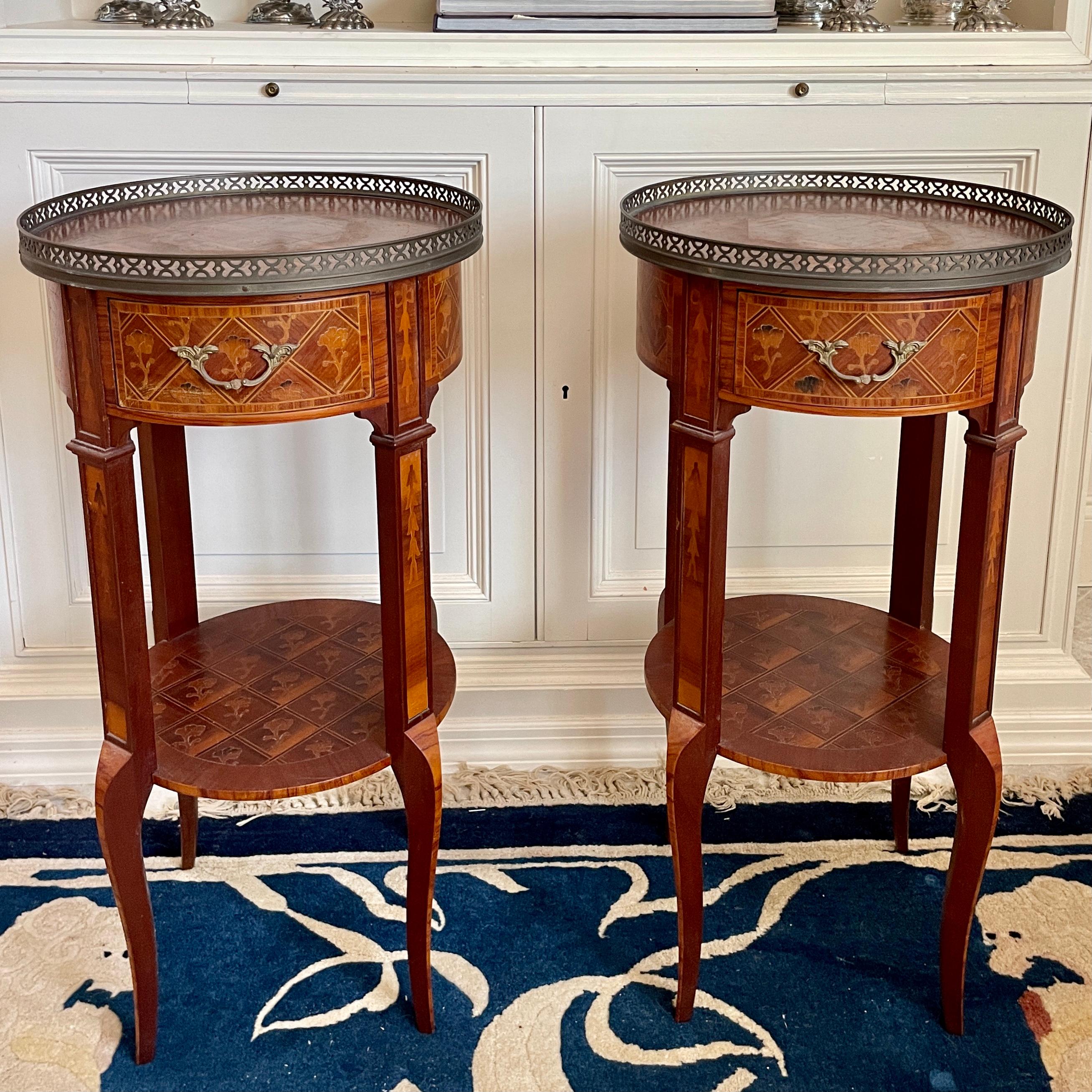 Beautiful pair of transition round top side tables from France. Great marquetry details. Nice addition to your French chic interiors.