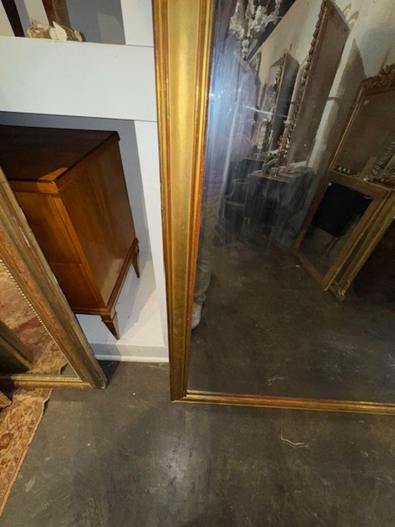 Miroir transitionnel français en bois doré en vente 1