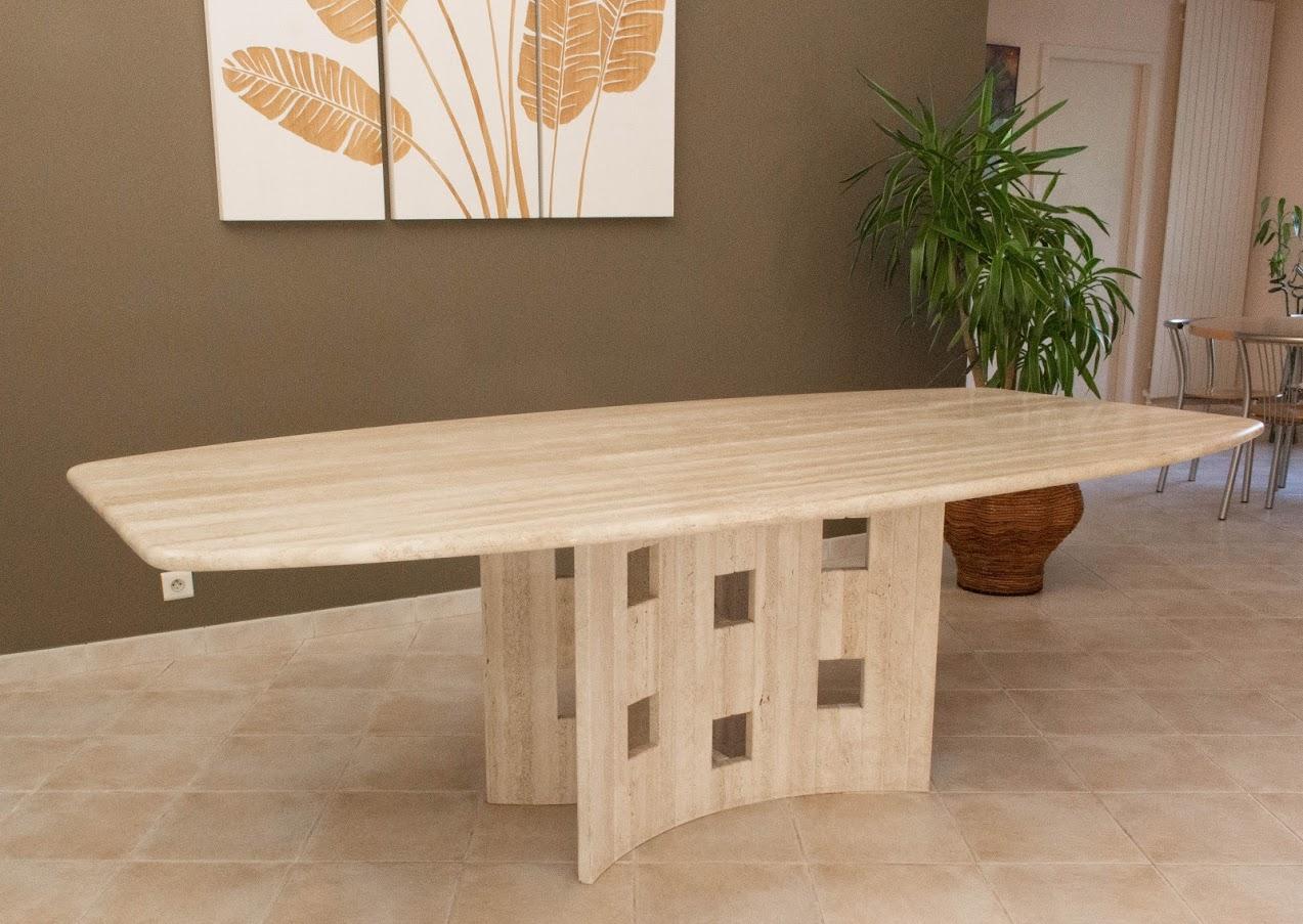 Conference table or dining table in travertine, French, circa 1980
Can also be used as a conference table
Measures of the table top: 31.5 in (80 cm) at the ends 47.24 in. (120 cm) in the center/230 cm
Very good condition (like new)

Shipping 
Table