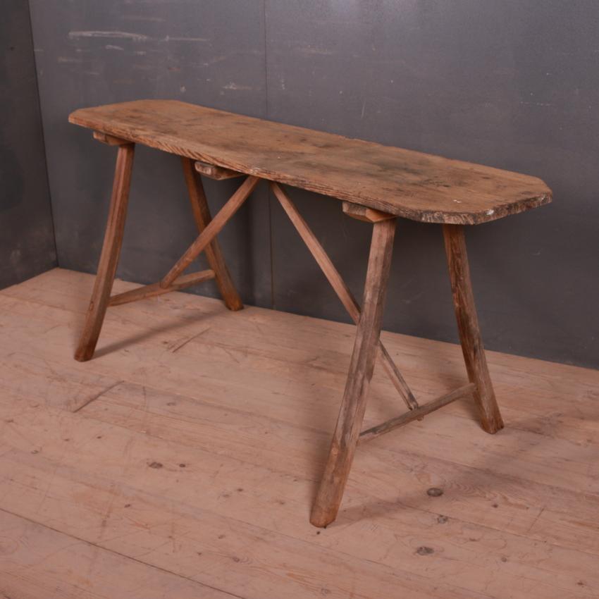 Large 19th century French scrubbed trestle table, 1860.

Dimensions:
63.5 inches (161 cms) wide
25 inches (64 cms) deep
28.5 inches (72 cms) high
Top depth 15