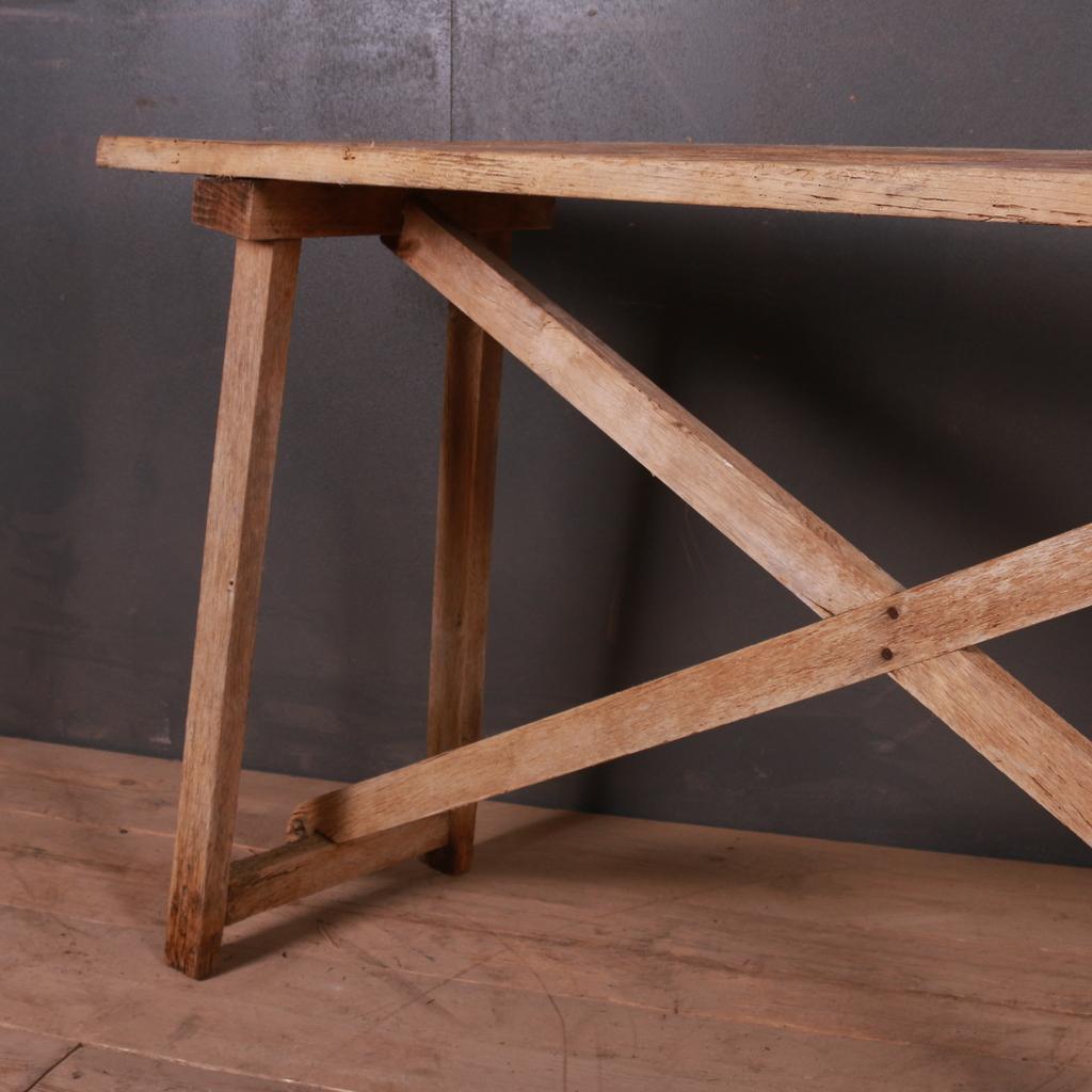 19th century French scrubbed oak and poplar trestle table, 1880.


Dimensions
59 inches (150 cms) wide
15 inches (38 cms) deep
30 inches (76 cms) high.