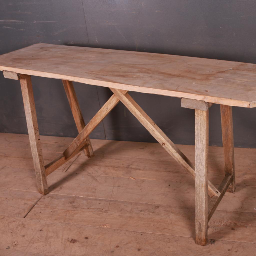 19th century French scrubbed oak and poplar trestle table, 1880.

Top depth 17