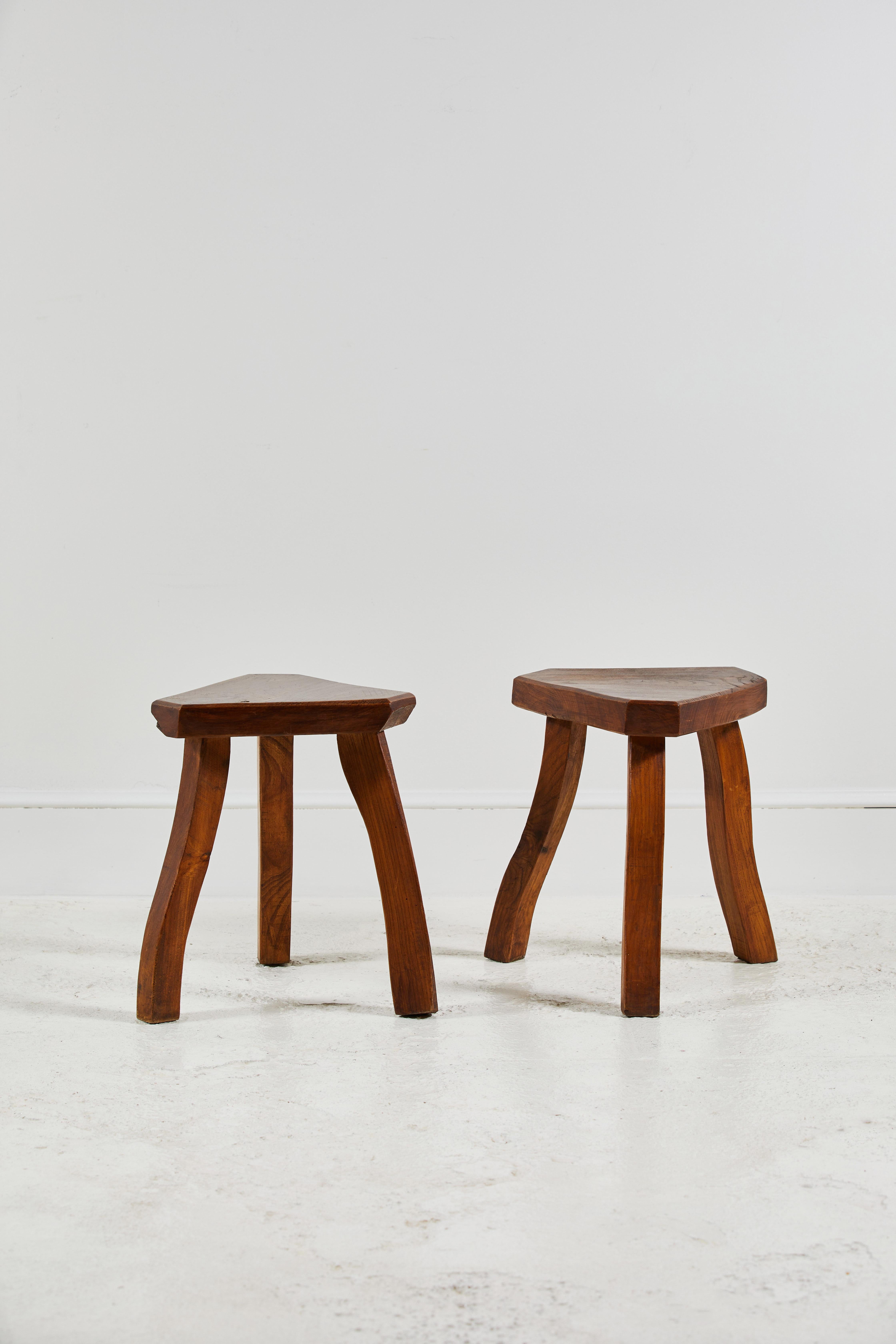 French rustic triangular wooden stool with three legs. Each stool sold individually.