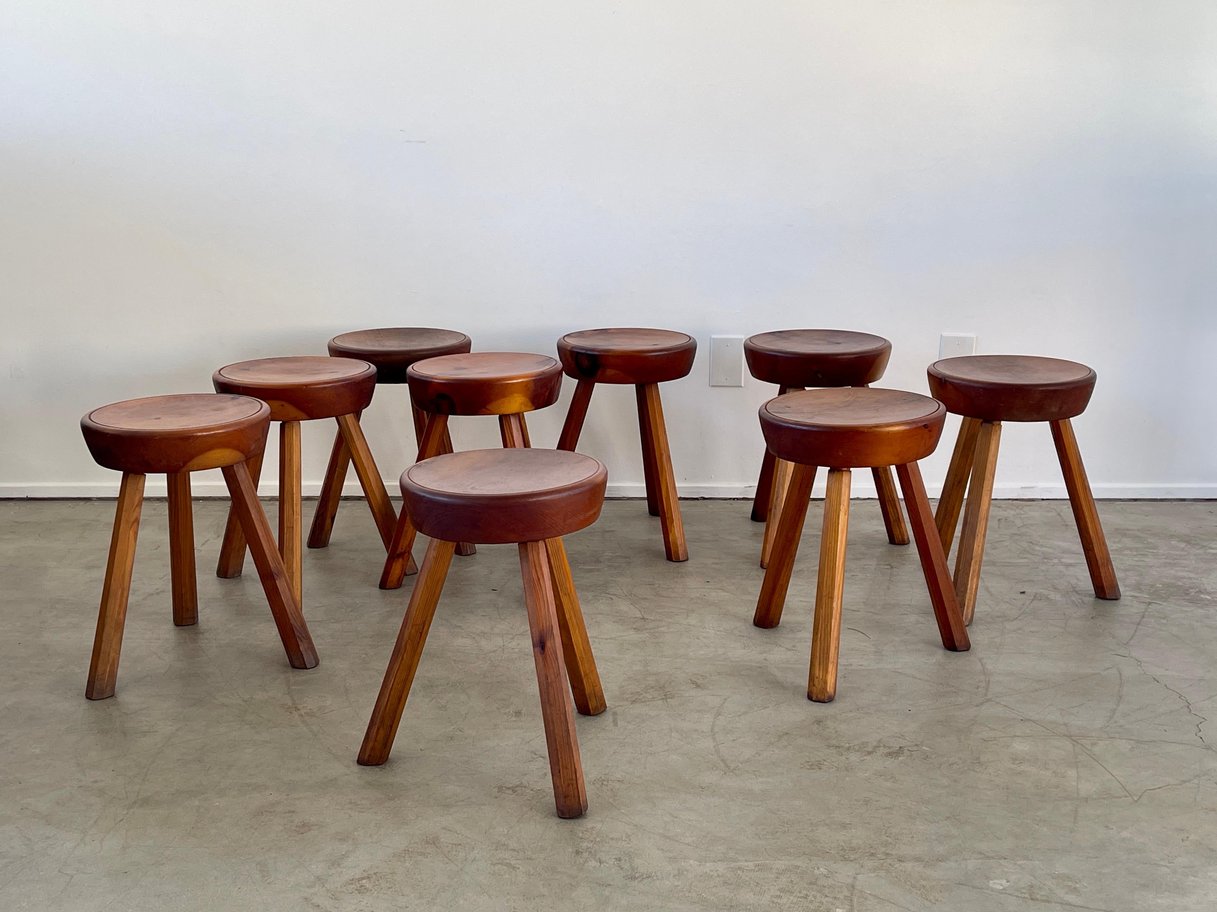 French pine stools in the style of Pierre Chapo / or Charlotte Perriand
Thick round wood tops on tripod legs 
Wonderful patina and scale.