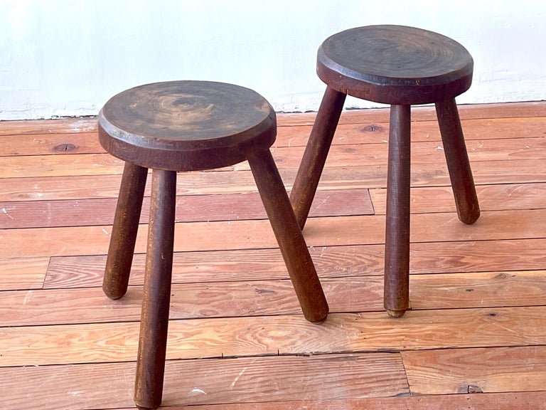 Pair of great French Oak tripod stools with wonderful patina.