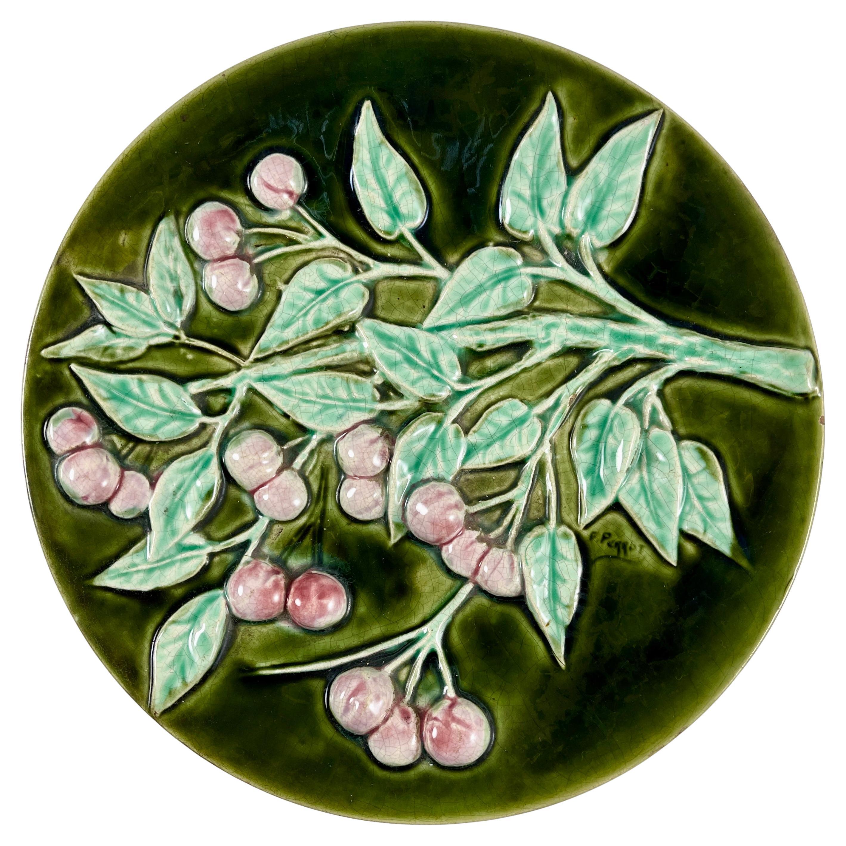 French Trompe l’Oeil Majolica Glazed Cherry Branch Wall Plaque, signed F. Perrot For Sale