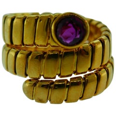 French Tubogas 18 Karat Yellow Gold and Pink Sapphire Ring Vintage, circa 1970s French Tubogas 18 Karat Yellow Gold and Pink Sapphire Ring Vintage, circa 1970s