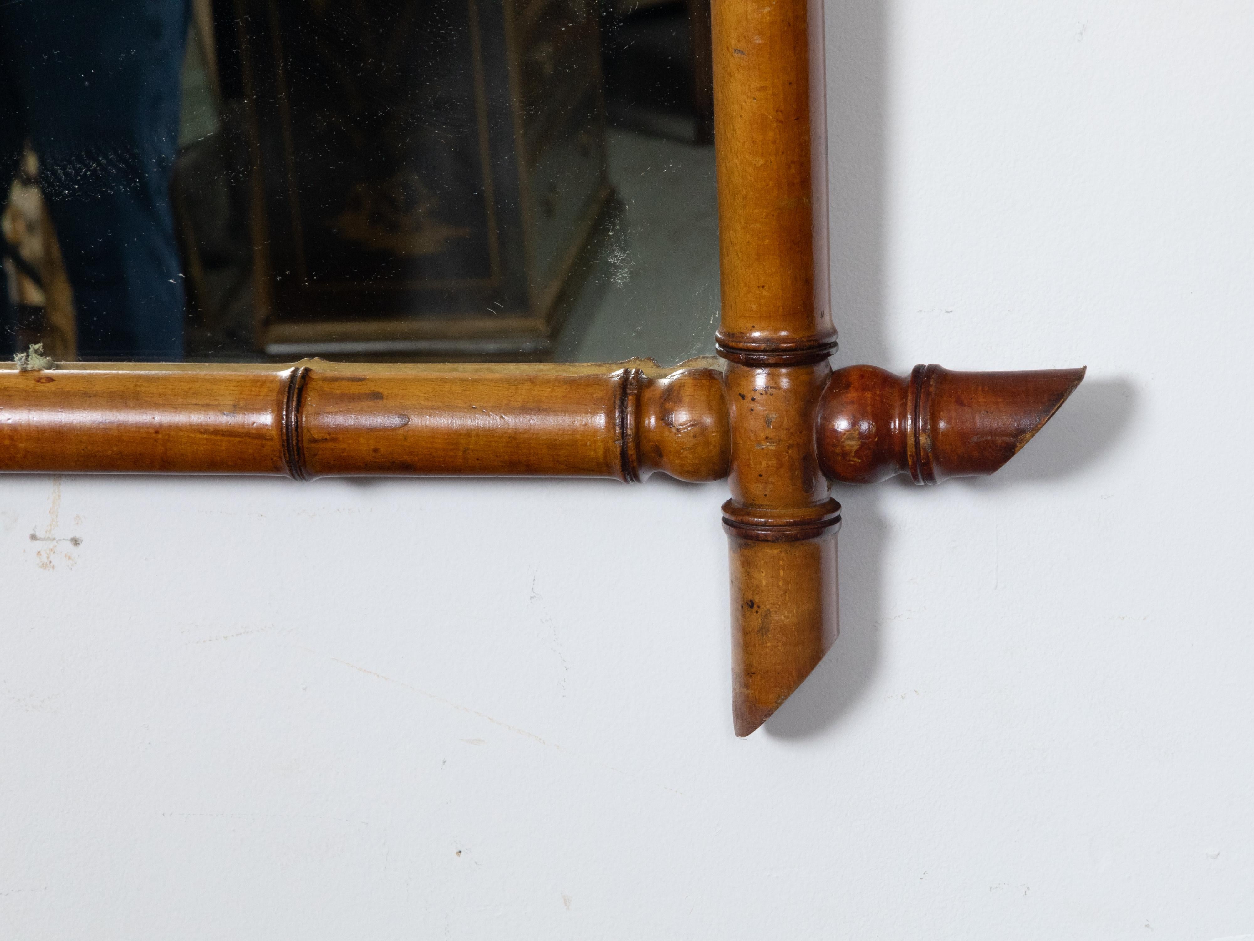 French Turn of the Century Brown Faux Bamboo Mirror with Intersecting Corners In Good Condition In Atlanta, GA