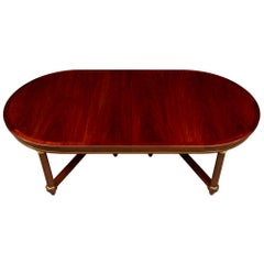 Tavolo da pranzo francese di fine secolo stile Impero in mogano fiammato e ormolano