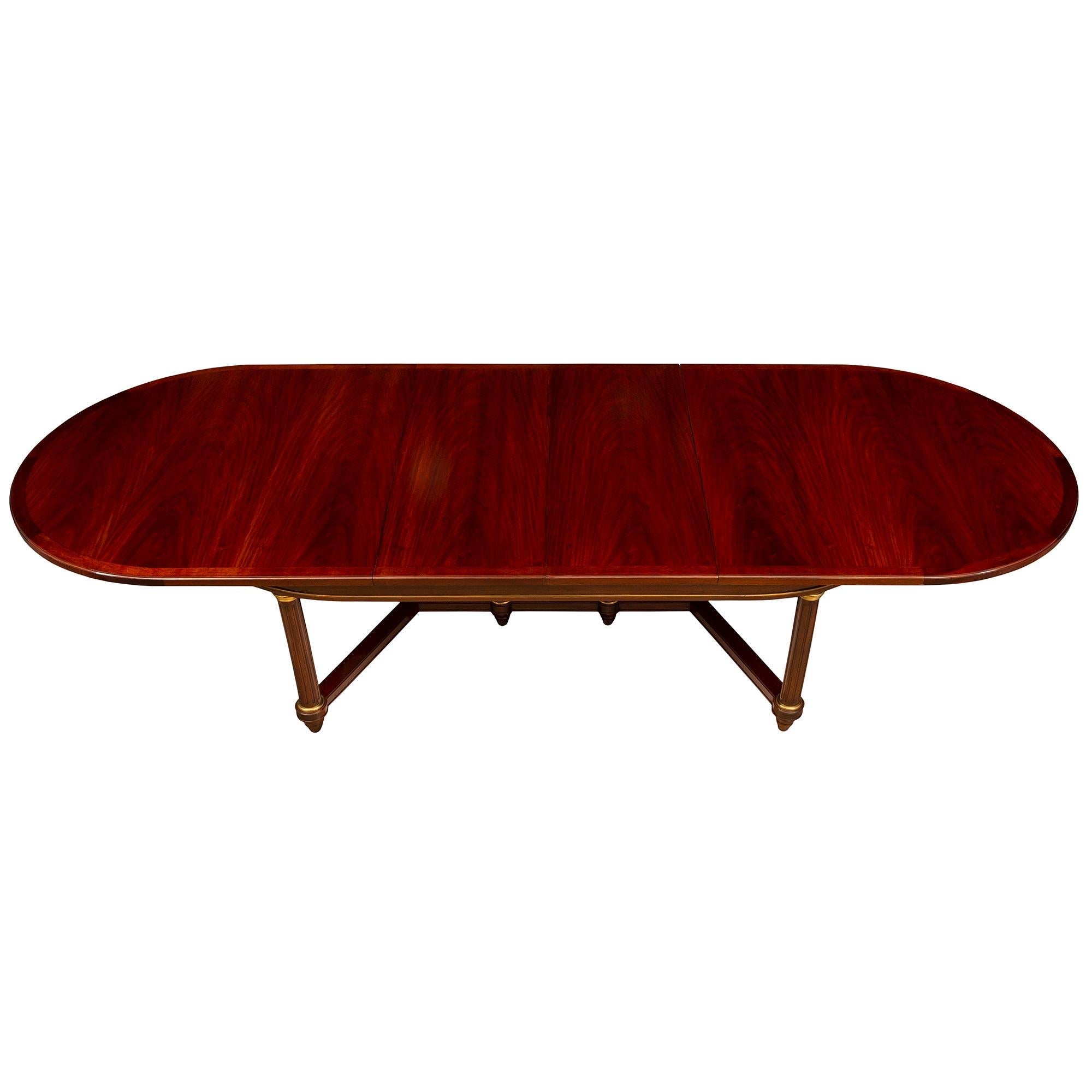 French Turn of the Century Empire St. Flamed Mahogany and Ormolu Dining Table In Good Condition For Sale In West Palm Beach, FL