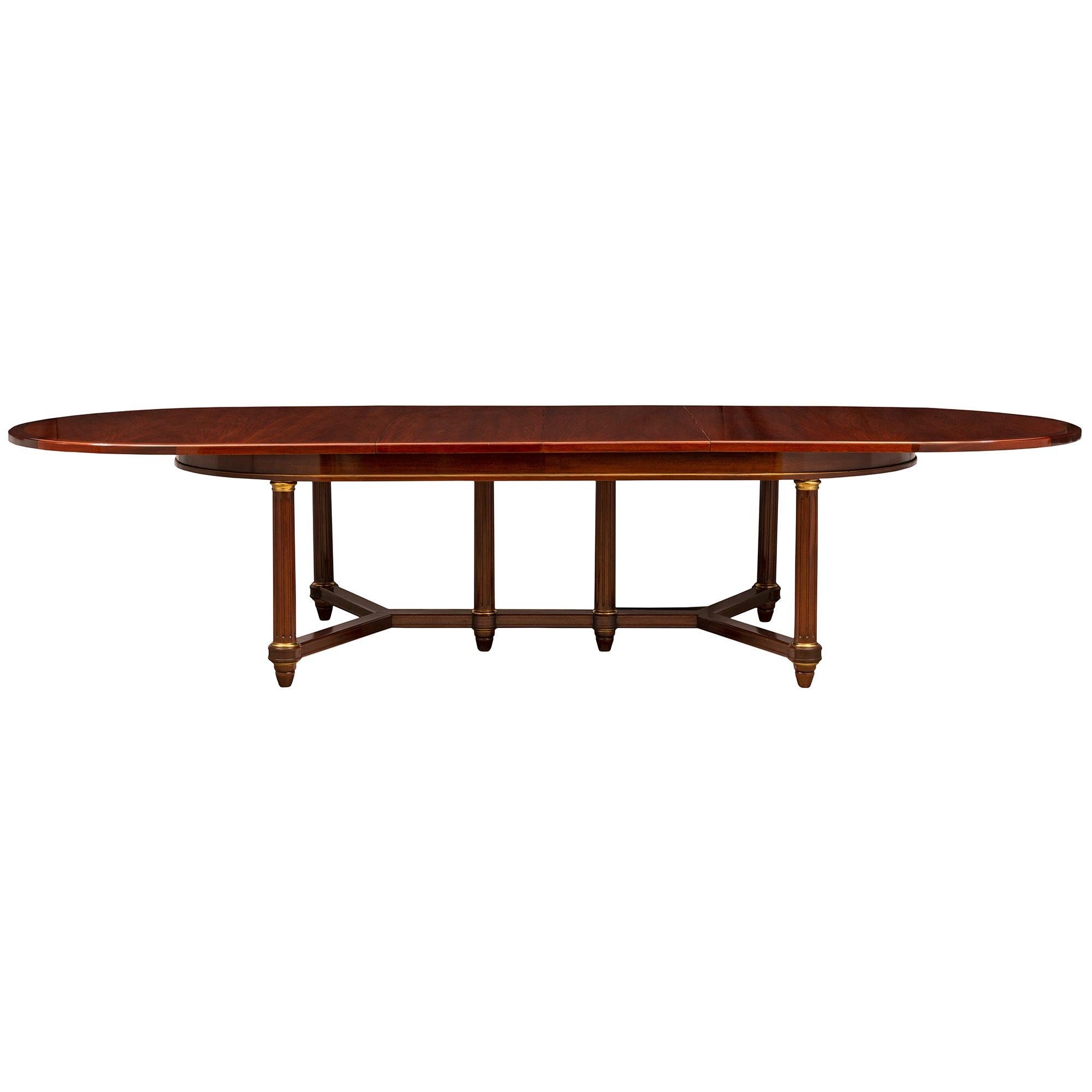 20th Century French Turn of the Century Empire St. Flamed Mahogany and Ormolu Dining Table For Sale