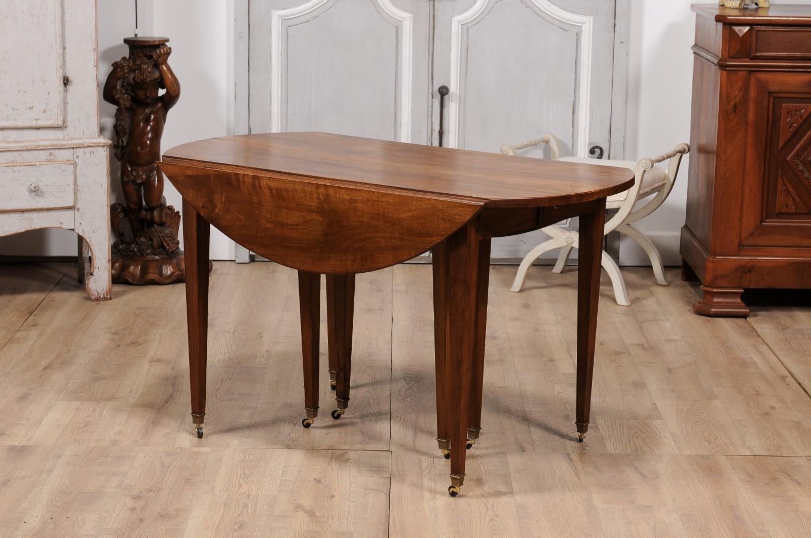 French Turn of the Century Extension Walnut Table With Five Leaves Circa 1900 In Good Condition For Sale In Atlanta, GA