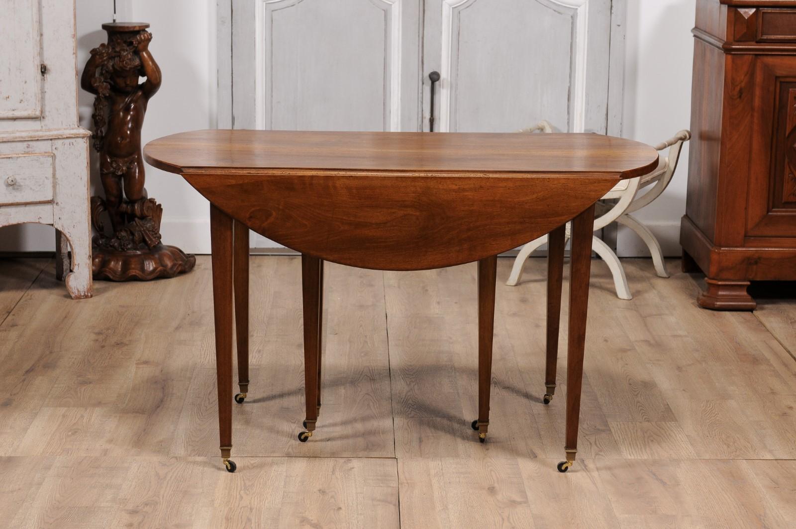 20th Century French Turn of the Century Extension Walnut Table With Five Leaves Circa 1900 For Sale