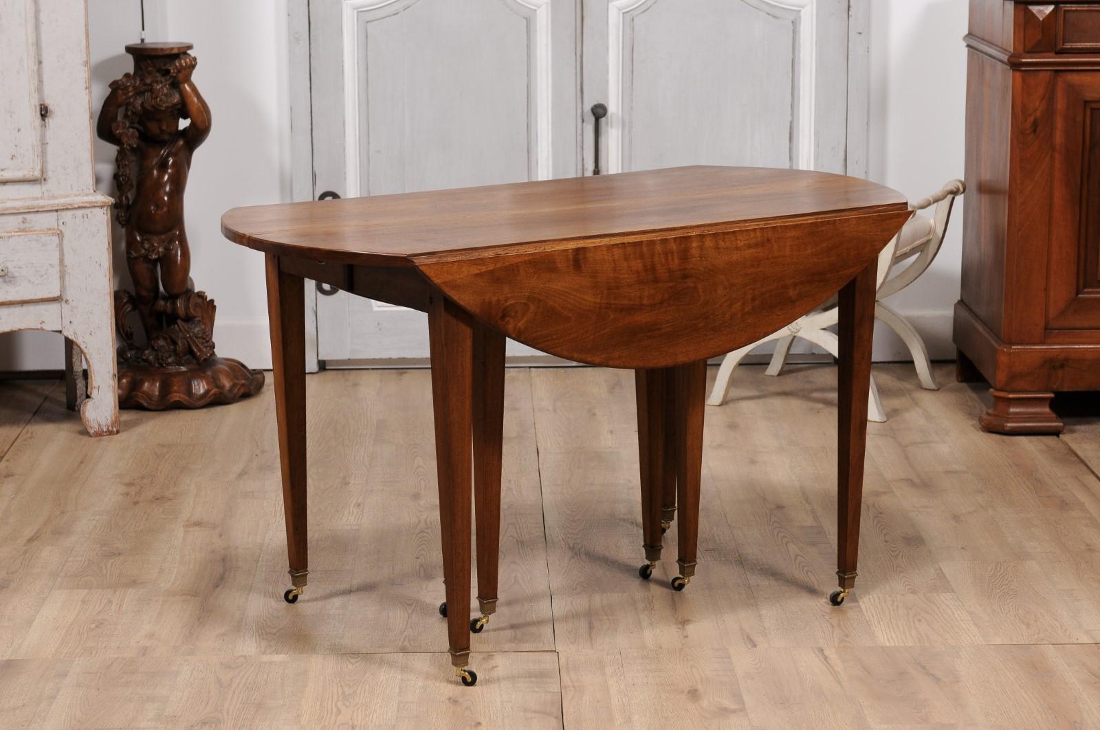 Brass French Turn of the Century Extension Walnut Table With Five Leaves Circa 1900 For Sale