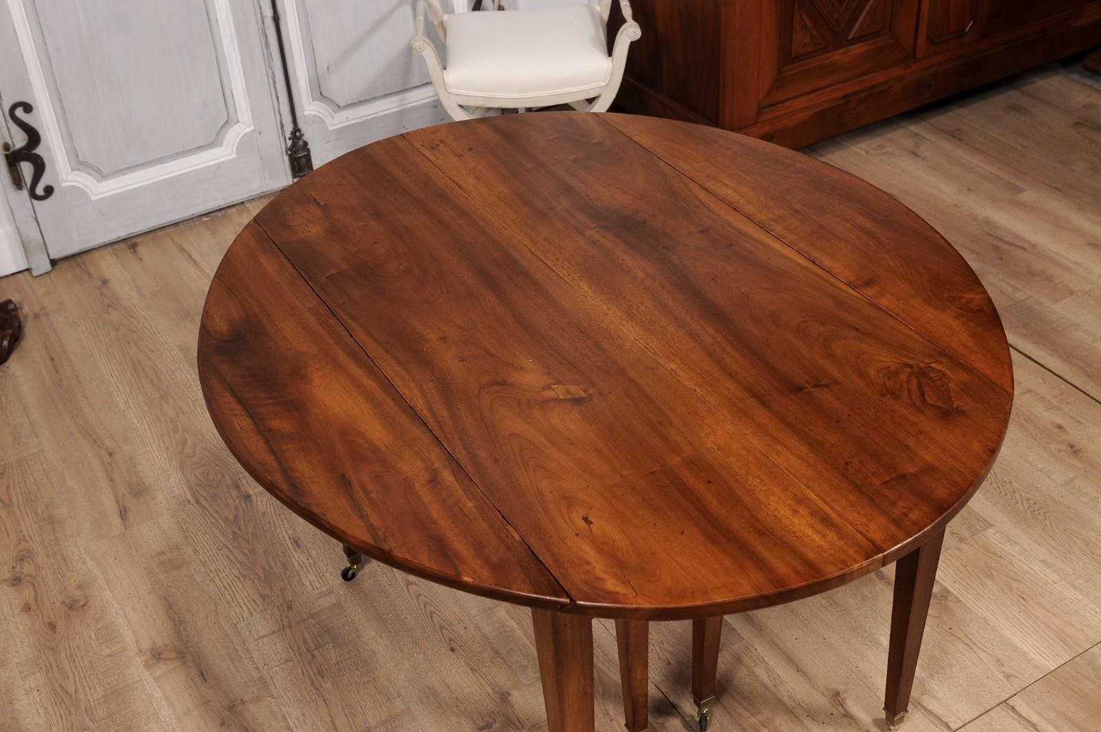 French Turn of the Century Extension Walnut Table With Five Leaves Circa 1900 For Sale 1