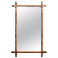 Antique French Turn of the Century Faux Bamboo Walnut Mirror with Protruding Corners