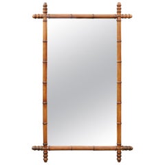 French Turn of the Century Faux Bamboo Walnut Mirror with Protruding Corners