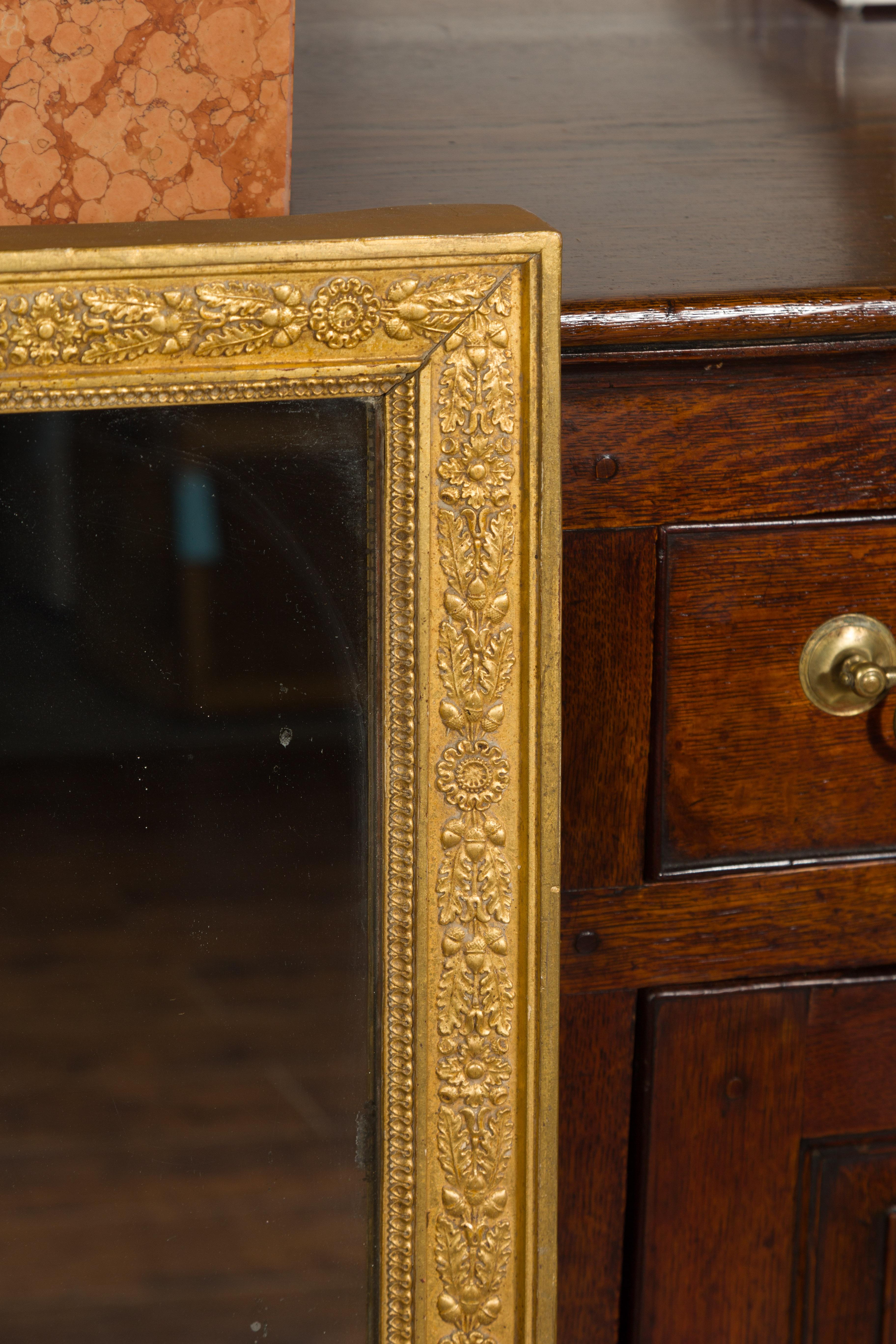 French Turn of the Century Giltwood Split Mirror with Foliage and Floral Frieze For Sale 1