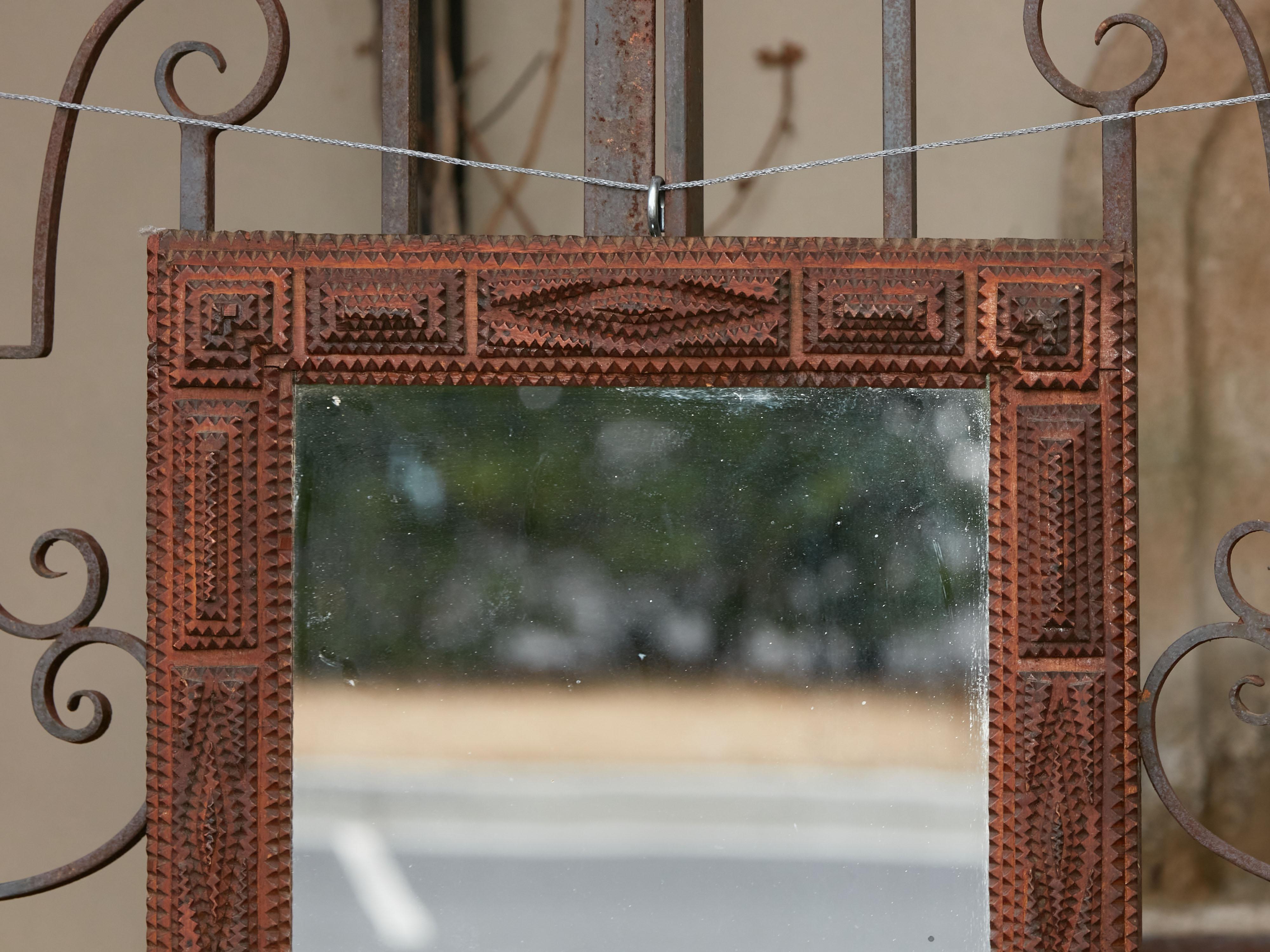 French Turn of the Century Hand Carved Tramp Art Folk Mirror with Raised Motifs In Good Condition In Atlanta, GA