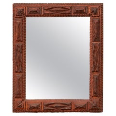 French Turn of the Century Hand Carved Tramp Art Folk Mirror with Raised Motifs