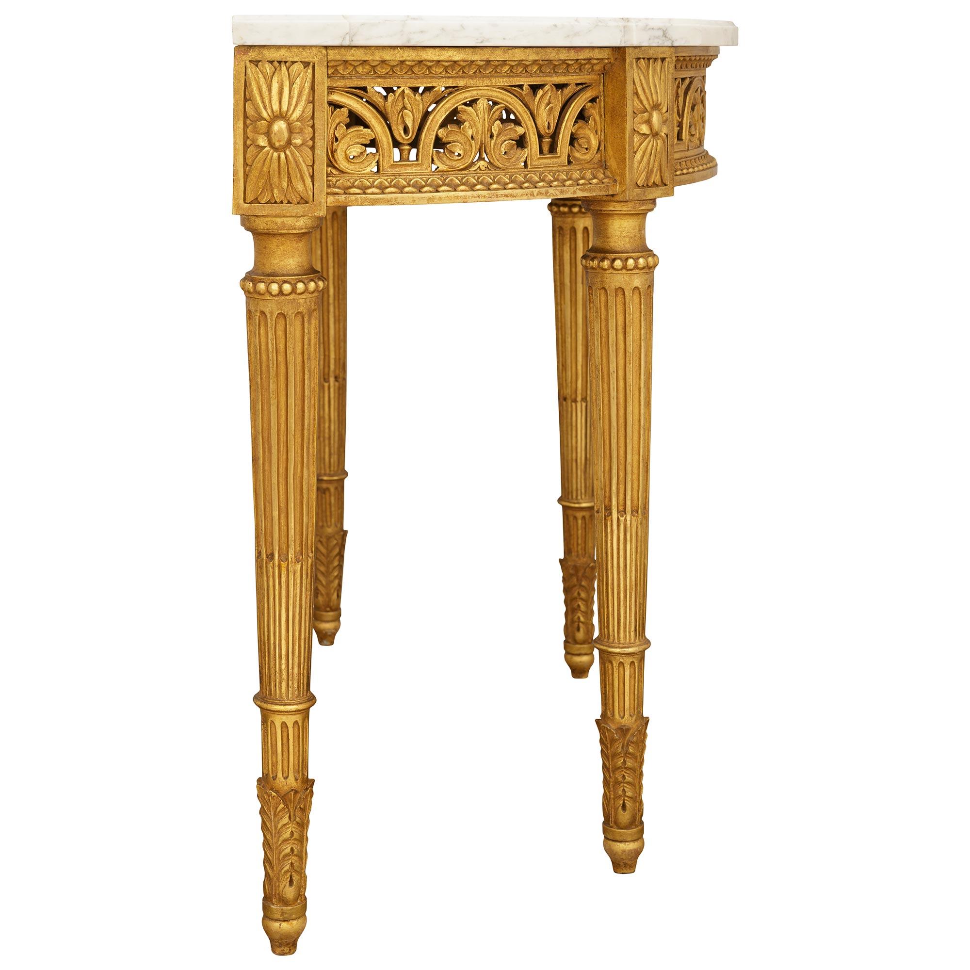 19th Century French Turn of the Century Louis XVI st. Giltwood and Carrara marble console For Sale