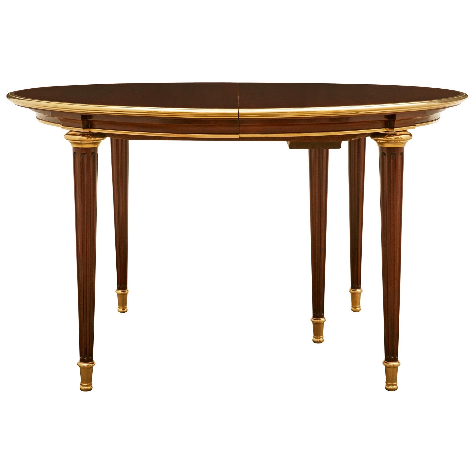 French Turn of the Century Louis XVI st. Mahogany and Ormolu dining table In Good Condition For Sale In West Palm Beach, FL