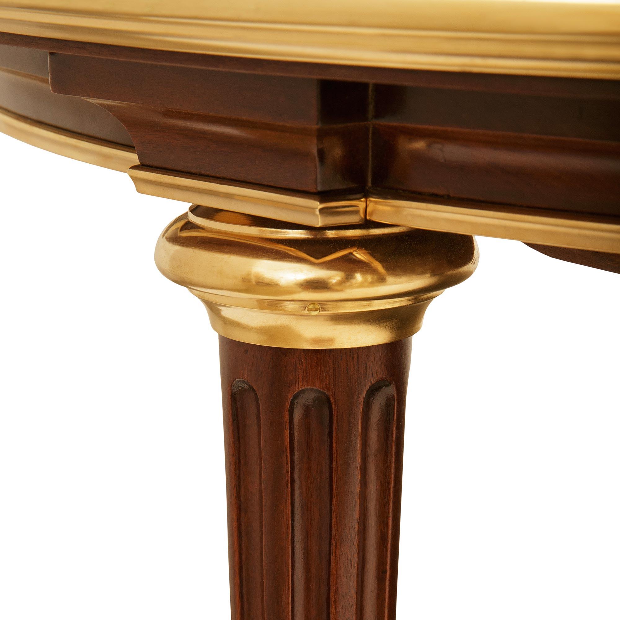 French Turn of the Century Louis XVI st. Mahogany and Ormolu dining table For Sale 1
