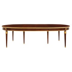 French Turn of the Century Louis XVI st. Mahogany and Ormolu dining table
