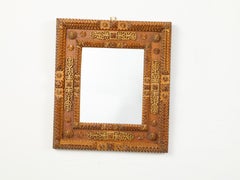 French Turn of the Century Tramp Art Mirror with Rosettes and Brass Motifs