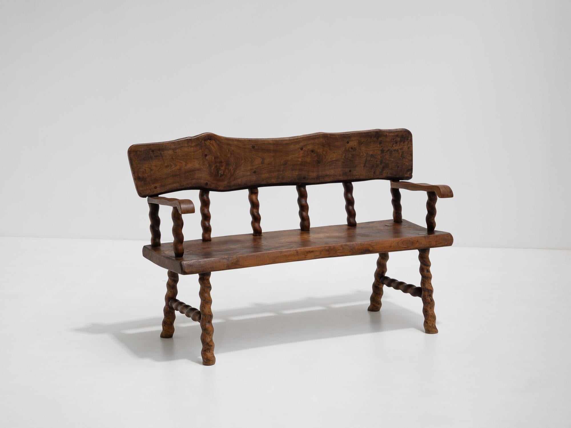 If you're looking for a unique bench that breaks away from traditional French designs, then this bench is the perfect choice for you. The bench dates back to the 1950s and this design era was known for both aesthetic and natural materials. The
