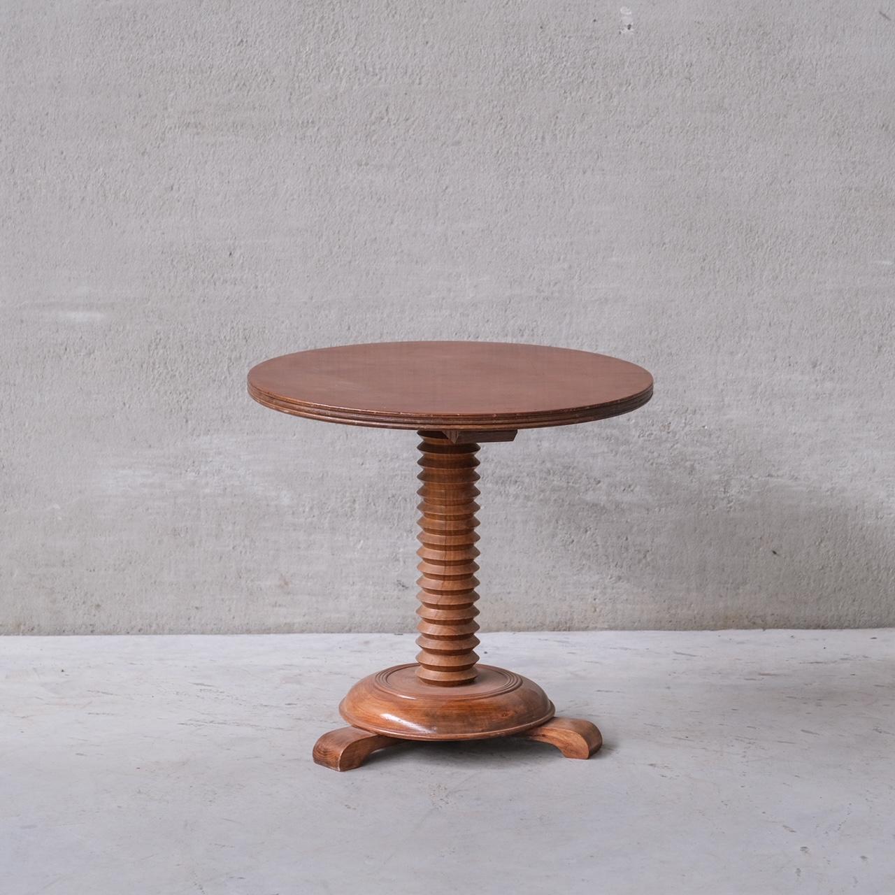 A good looking side table or display table. 

France, c1950s. 

Late deco in the manner of Charles Dudouyt. 

Generally good condition, some scuffs and wear commensurate with age. 

Location: Belgium Gallery. 

Dimensions: 55 H x 51 Diameter in cm.