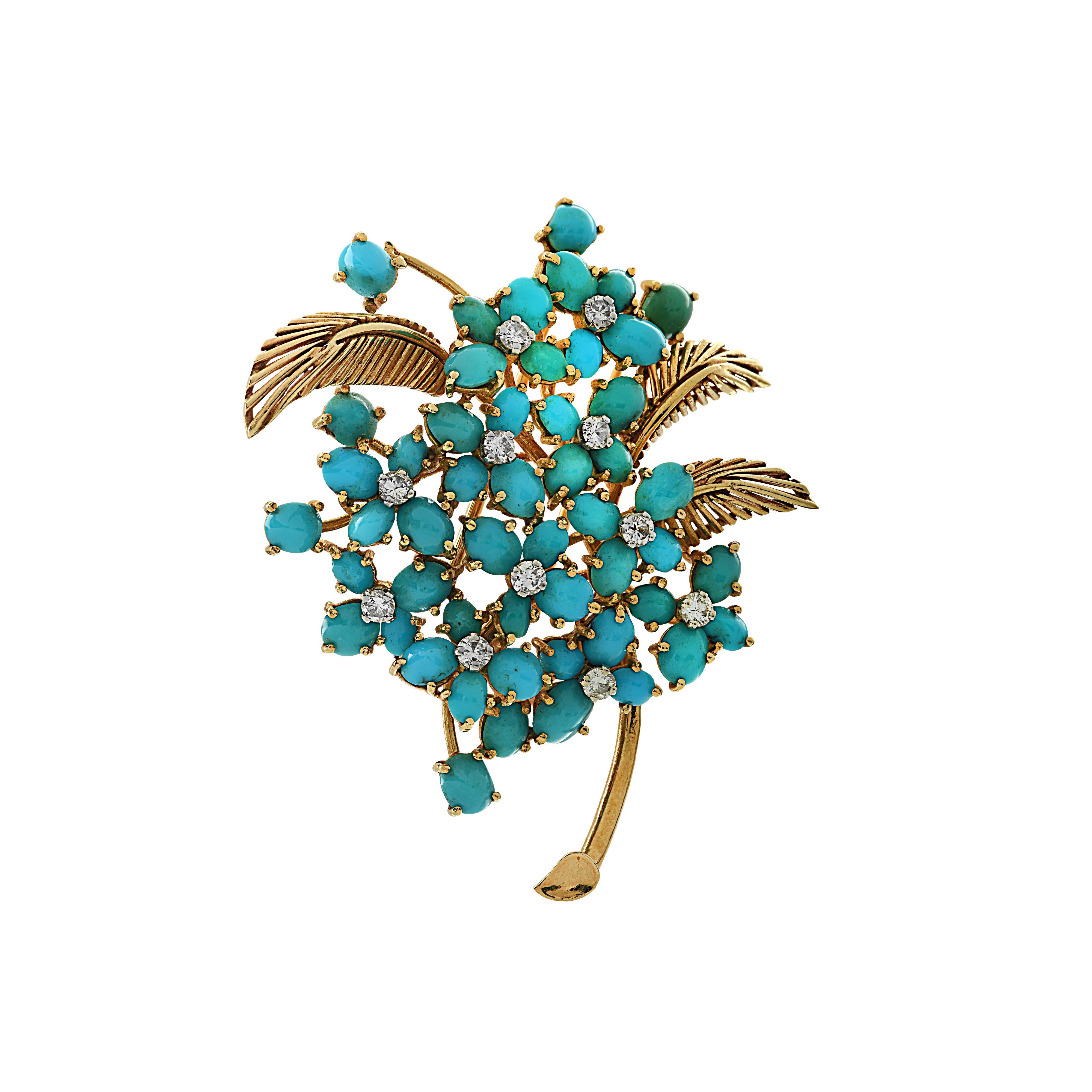 Ornate French brooch pin crafted in 18 karat yellow gold, featuring turquoise cabochons arranged in flower clusters, detailed with 11 round brilliant cut diamonds weighing approximately .35 carats total, G color, VS-SI clarity.  This delightful