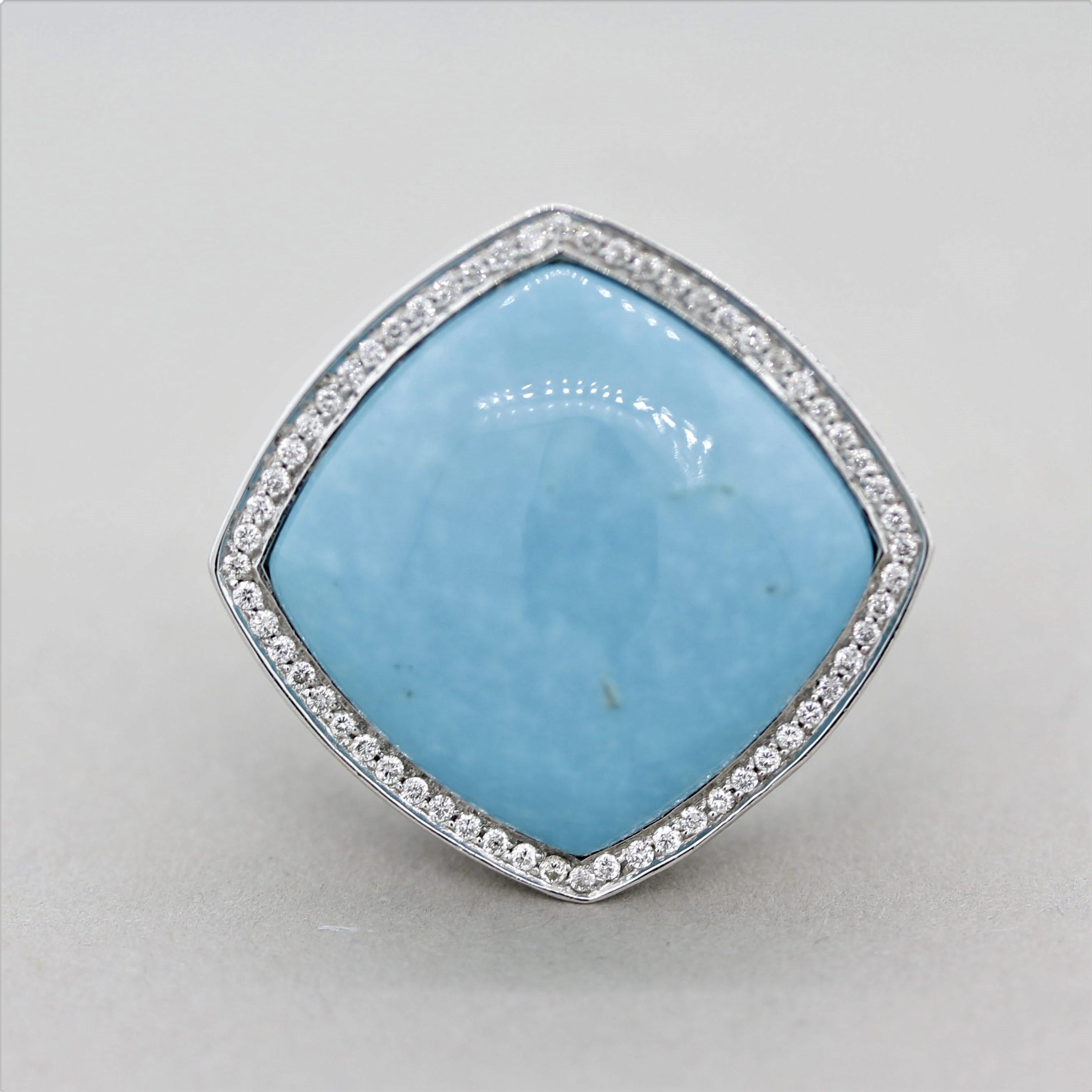 An exceptional ring made in France featuring a large piece of sky-blue turquoise in a kite shape. It is accented by 3.19 carats of fine round brilliant-cut diamonds which accented the turquoise with brightness and sparkle. Made in 18k white gold