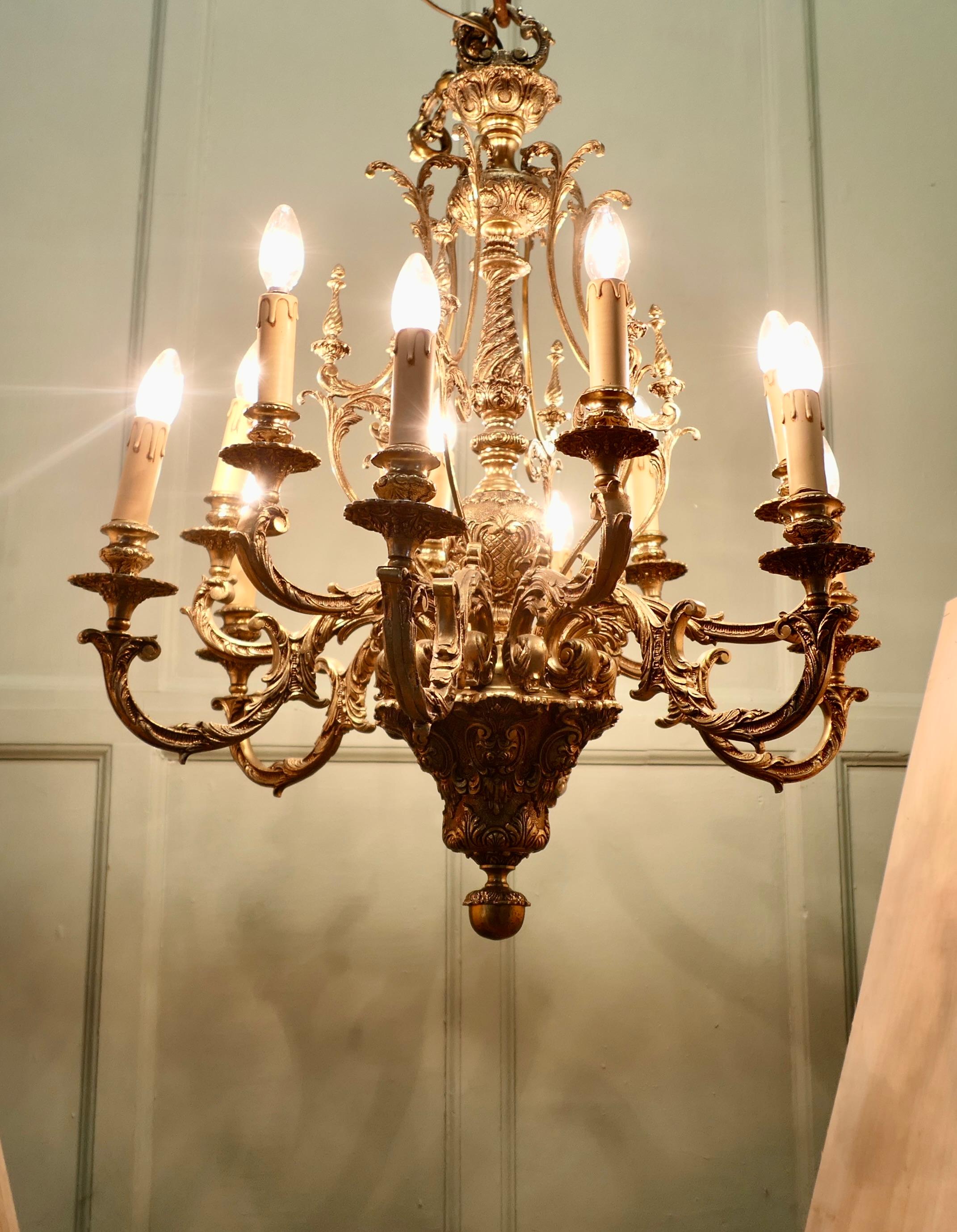 French Provincial French Twelve Branch Two Tier Gilded Brass Chandelier For Sale