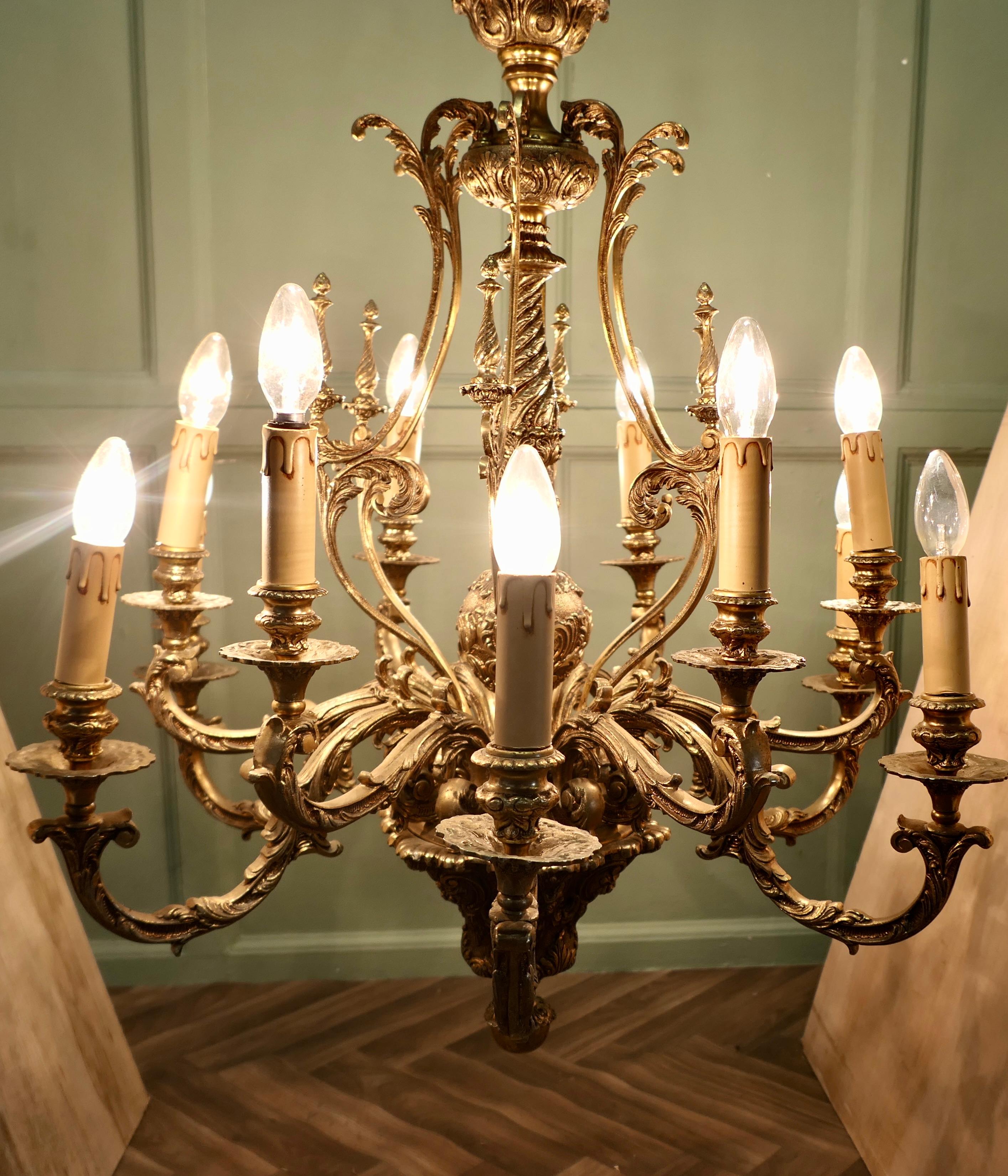 20th Century French Twelve Branch Two Tier Gilded Brass Chandelier For Sale
