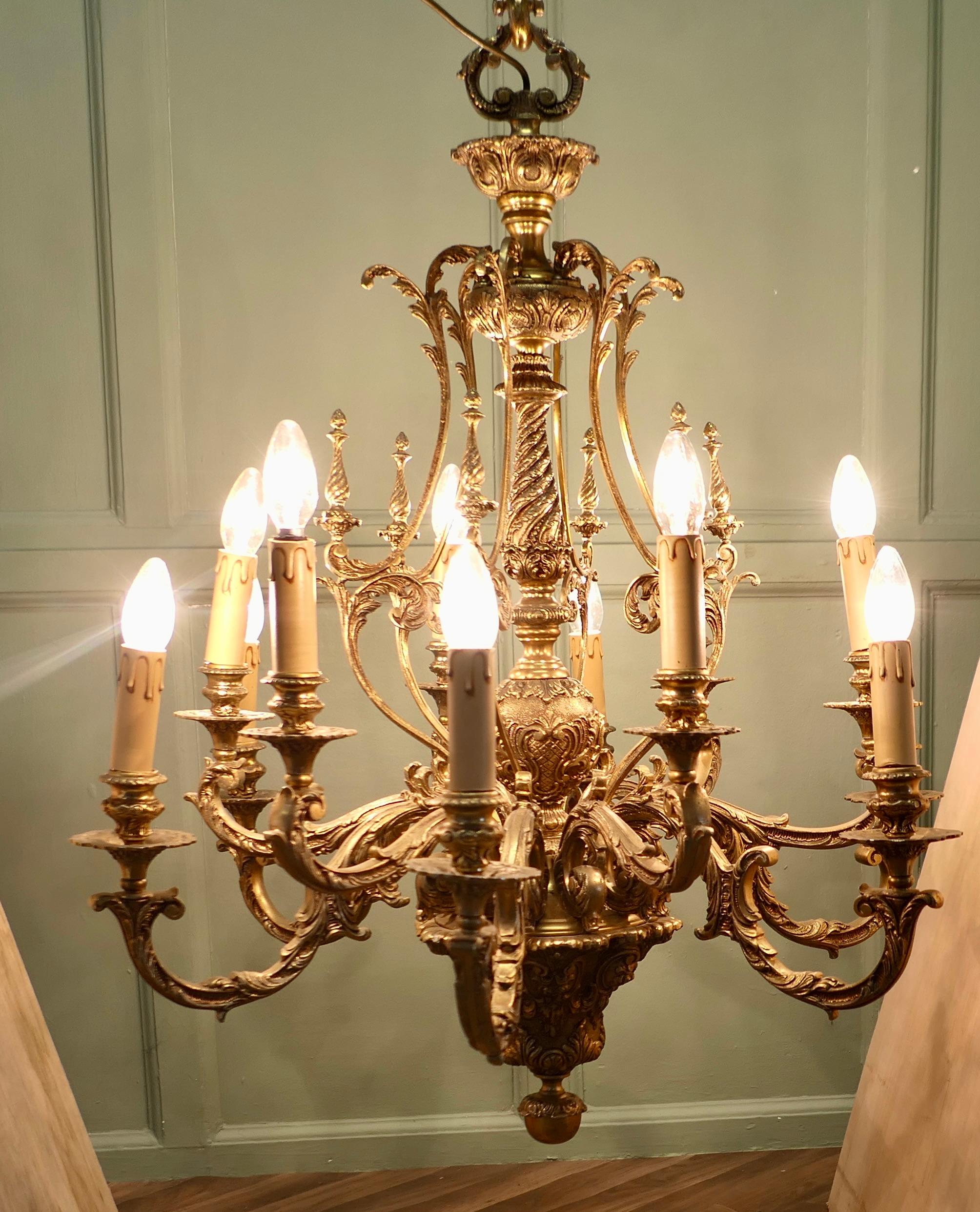 French Twelve Branch Two Tier Gilded Brass Chandelier For Sale 1