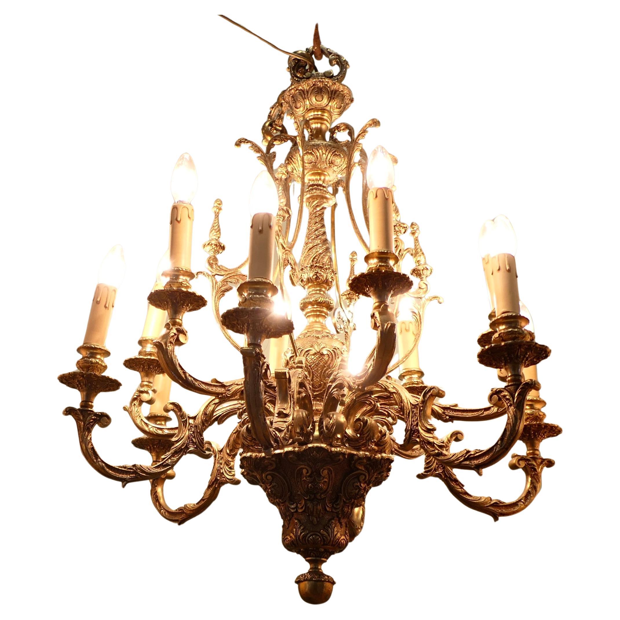 French Twelve Branch Two Tier Gilded Brass Chandelier For Sale