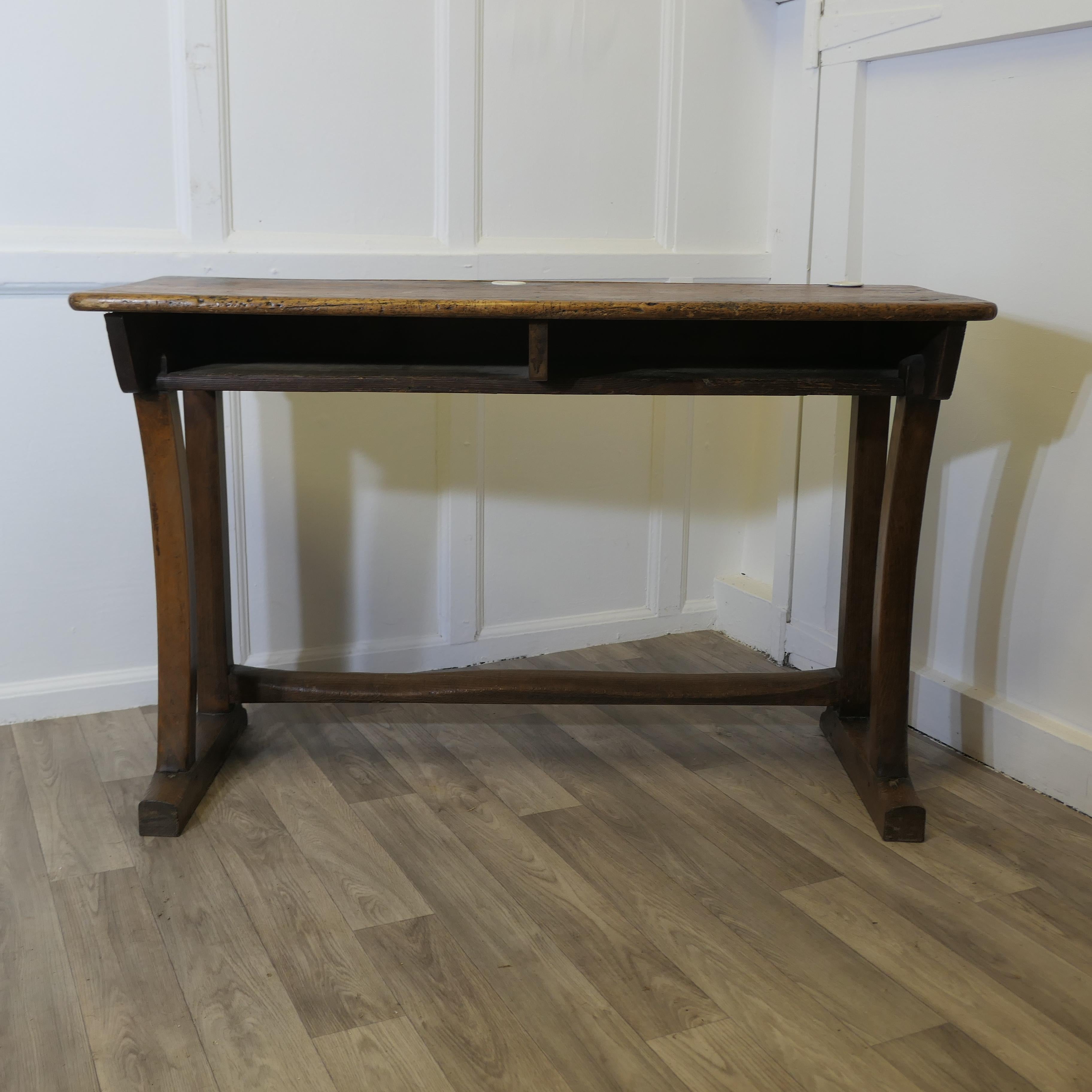 French Twin Clerks Reception Desk, Rustic Pine, Greeter

The table is full length, with 2 storage compartments under, it stands on sturdy stretchered legs  
A Great Stand Alone in its original age darkened pine, with 2 ceramic inkwells or posey
