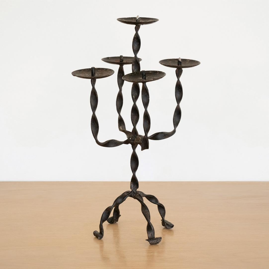Incredible vintage candelabra with five arms made from twisted iron from France. Nice age and patina. 