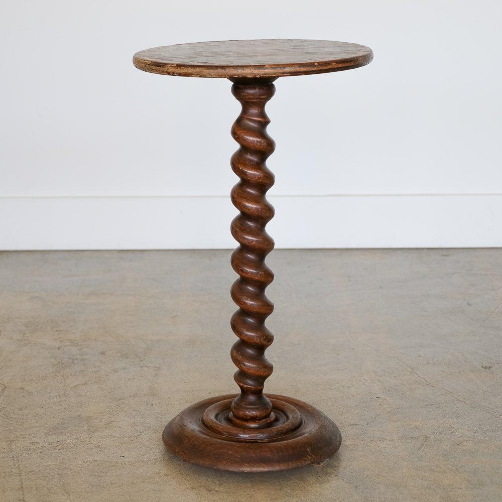 Great wood pedestal table with beautiful twisted wood stem from France, 1940s. Circular tiered base and circular top measures 11.75